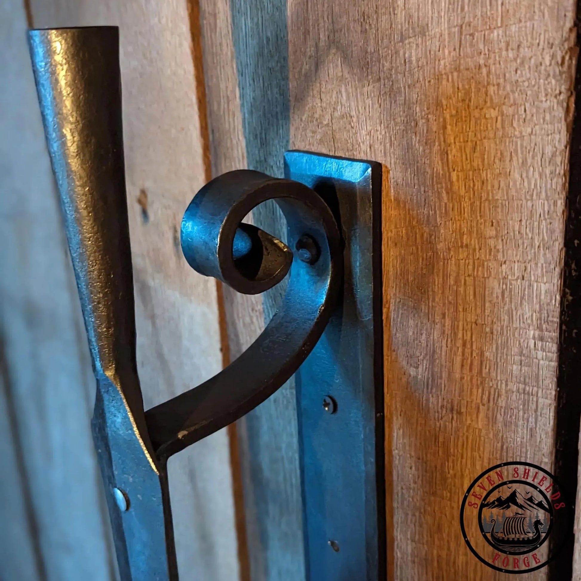 Forged spear sconce
