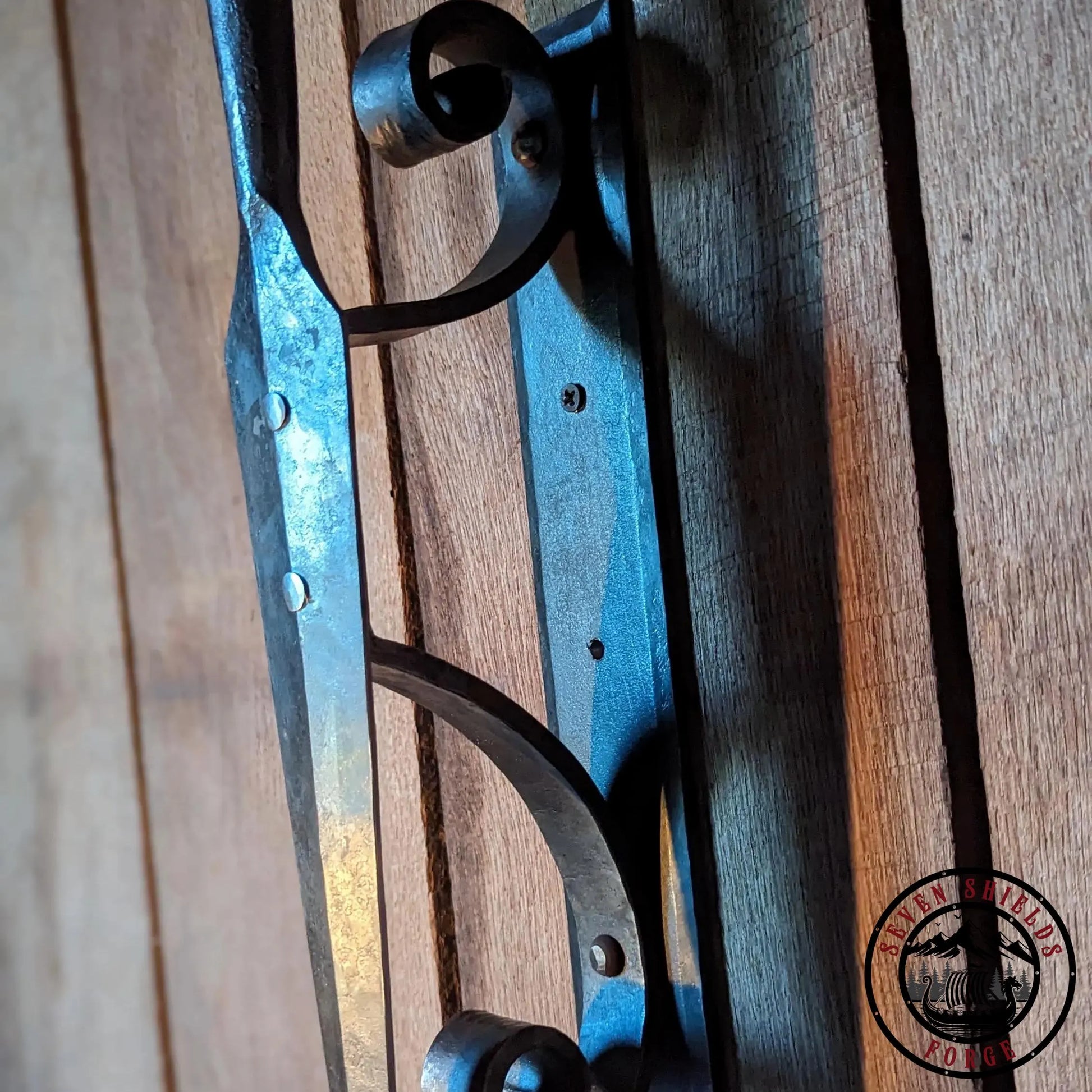 Forged spear sconce